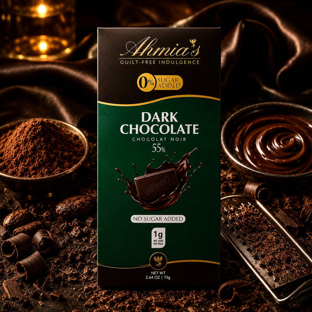 A box of Ahmia's 55% Sugar-Free Dark Chocolate chocolate bar is centered against a dark, richly styled background with chocolate sauce, cocoa powder, and chocolate curls.